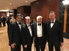 Herb Vincent at the 2018 National Football Foundation dinner with CoSIDA legends and fellow Hall of Famers Langston Rogers, Bill Little and John Heisler.